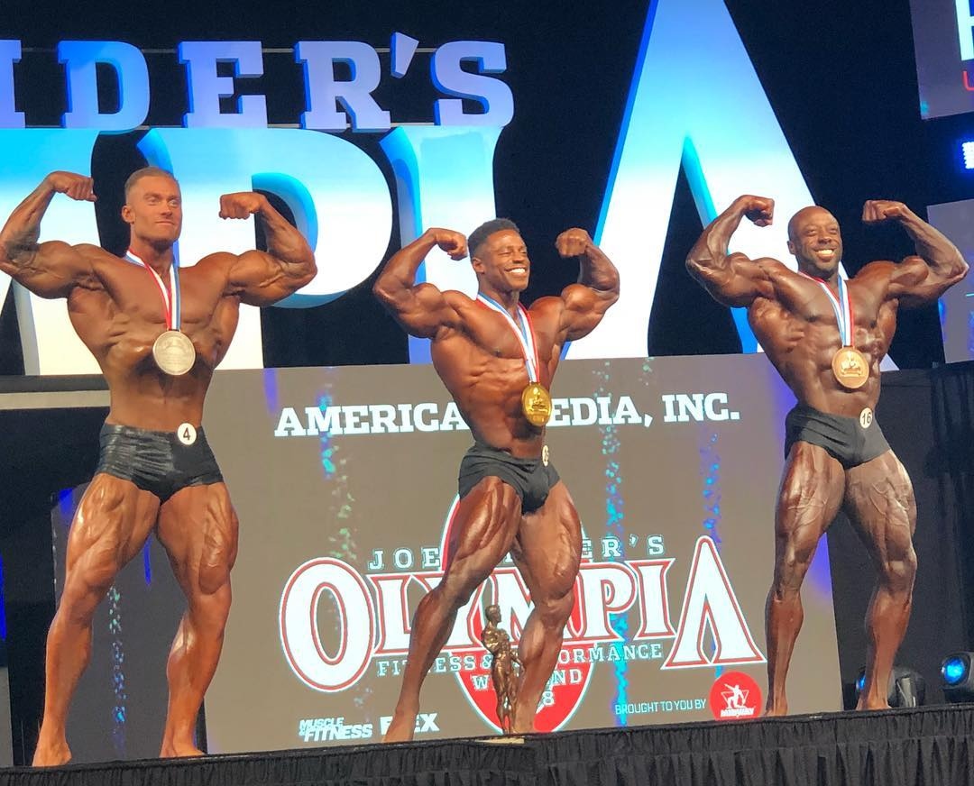 Breon Ansley · Breon Ansley and Chris Bumstead in a front double-biceps comparison at the 2018 Classic Physique Olympia