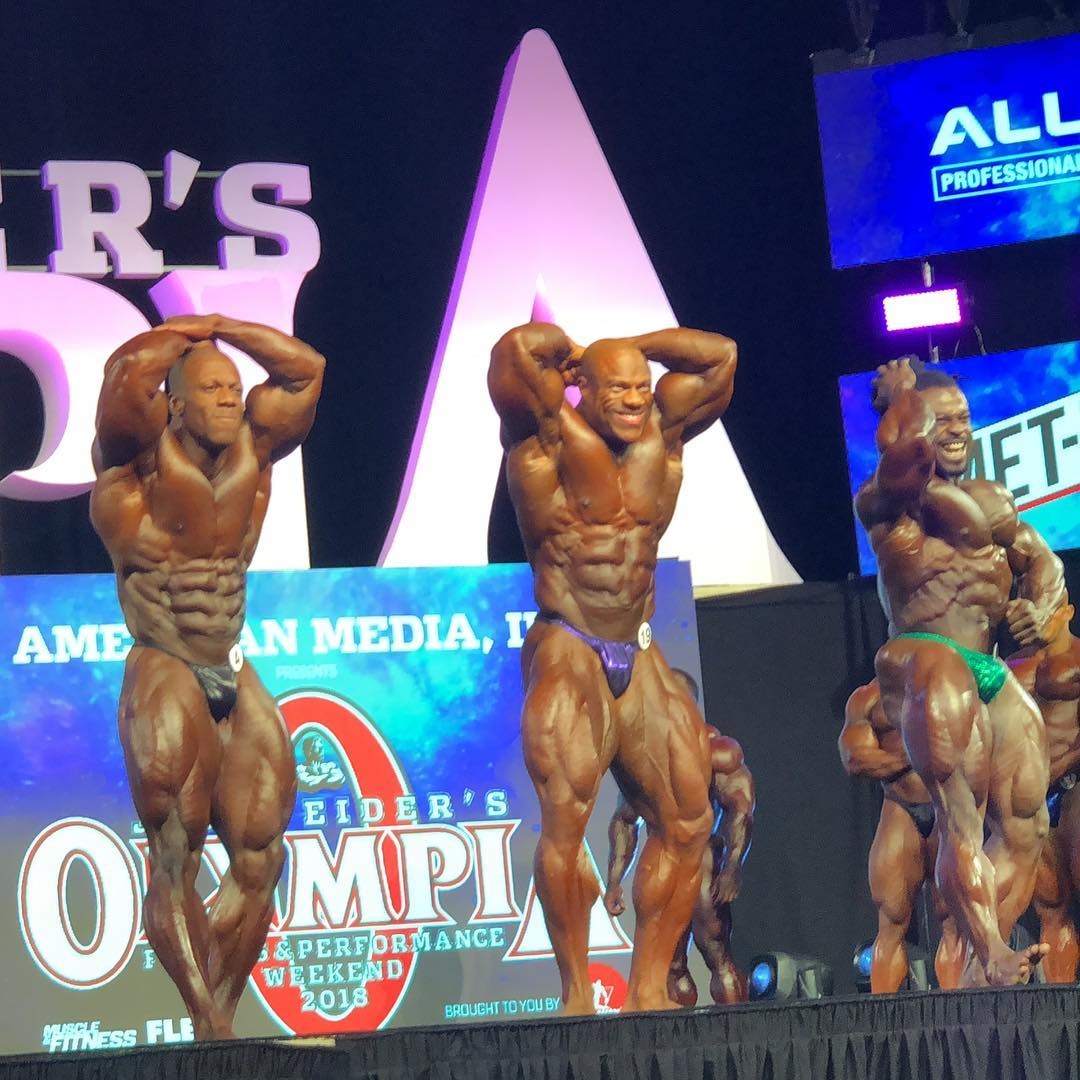 Brandon Hendrickson · Brandon Hendrickson and fellow finalists in a front comparison at the 2018 Men’s Physique Olympia